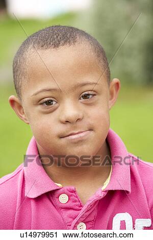 9 year old boy with Downs Syndrome View Large Photo Image Stock Image - 9 year old boy with Downs Syndrome. Fotosearch