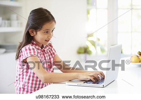 Asian Child Using Laptop At Home View Large Photo Image Stock Image - Asian Child Using Laptop At Home. Fotosearch