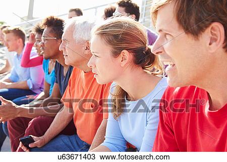 Stock Image - Audience Watching Outdoor Concert Performance. Fotosearch