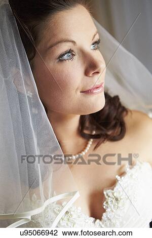 Stock Image - Beautiful Bride Wearing Wedding Dress. Fotosearch