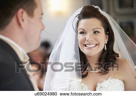 Bride And Groom During Wedding Ceremony View Large Photo Image Stock Image - Bride And Groom During Wedding Ceremony. Fotosearch