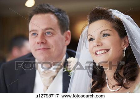 Stock Photo - Bride And Groom During Wedding Ceremony. Fotosearch