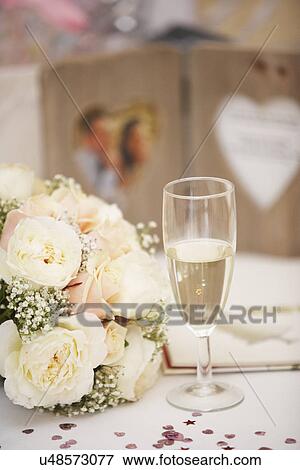 Bride's Bouquet And Glass Of Champagne On Wedding day View Large Photo Image Stock Photo - Bride's Bouquet And Glass Of Champagne On Wedding day. Fotosearch