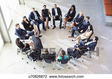 Businessman Addressing Multi-Cultural Office Staff Meeting View Large Photo Image Stock Image - Businessman Addressing Multi-Cultural Office Staff Meeting. Fotosearch