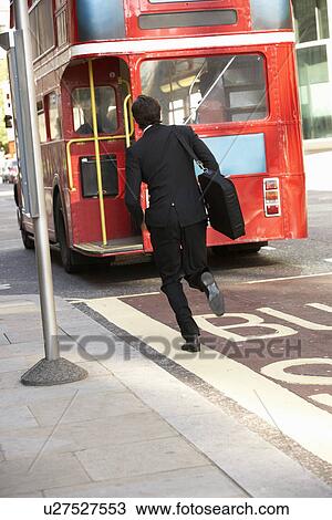 Businessman running for bus View Large Photo Image Stock Image - Businessman running for bus. Fotosearch