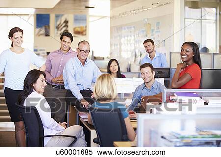 Businesspeople Having Meeting In Modern Open Plan Office View Large Photo Image Stock Photography - Businesspeople Having Meeting In Modern Open Plan Office. Fotosearch