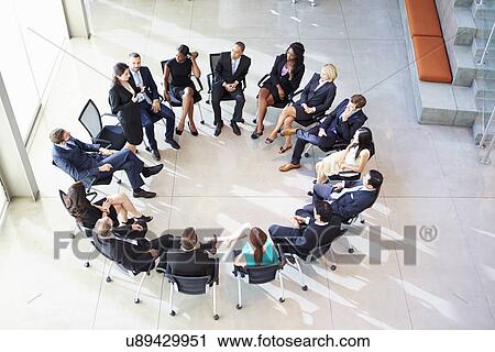 Businesswoman Addressing Multi-Cultural Office Staff Meeting View Large Photo Image Stock Image - Businesswoman Addressing Multi-Cultural Office Staff Meeting. Fotosearch