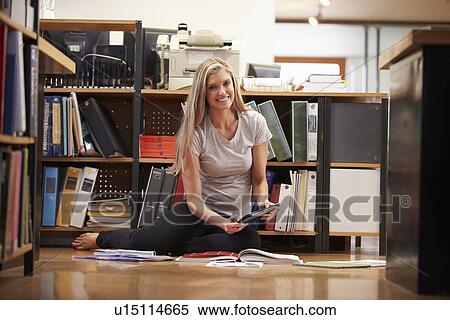 Businesswoman Sitting On Office Floor With Digital Tablet View Large Photo Image Stock Photography - Businesswoman Sitting On Office Floor With Digital Tablet. Fotosearch