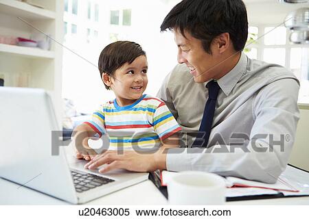 Busy Father Working From Home With Son View Large Photo Image Stock Photography - Busy Father Working From Home With Son. Fotosearch