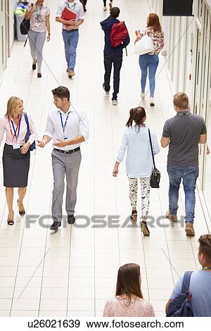 Stock Photo - Busy Hallway In College With Students. Fotosearch