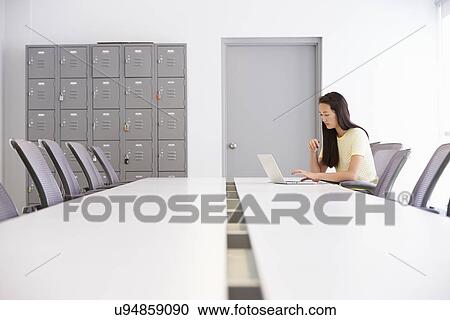 Casually Dressed Woman Working In Design Studio View Large Photo Image Stock Image - Casually Dressed Woman Working In Design Studio. Fotosearch