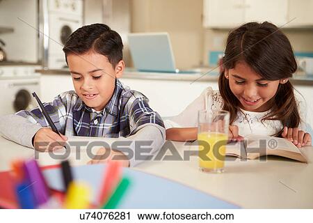 Children Doing Homework Together At Table View Large Photo Image Stock Image - Children Doing Homework Together At Table. Fotosearch