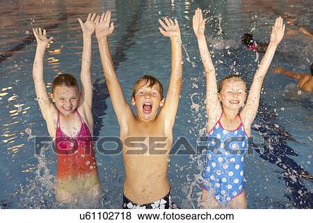 Children in swimming pool View Large Photo Image Stock Photo - Children in swimming pool. Fotosearch