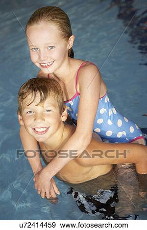 Children in swimming pool View Large Photo Image Stock Photo - Children in swimming pool. Fotosearch
