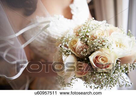 Close Up Of Bride Holding Bouquet View Large Photo Image Stock Image - Close Up Of Bride Holding Bouquet. Fotosearch