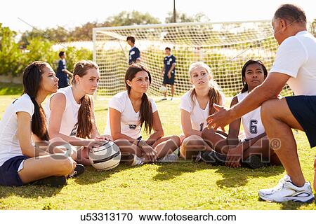 Coach Giving Team Talk To Female High School Soccer Team View Large Photo Image Stock Image - Coach Giving Team Talk To Female High School Soccer Team. Fotosearch