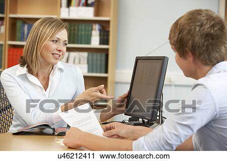 College tutor with student View Large Photo Image Stock Image - College tutor with student. Fotosearch