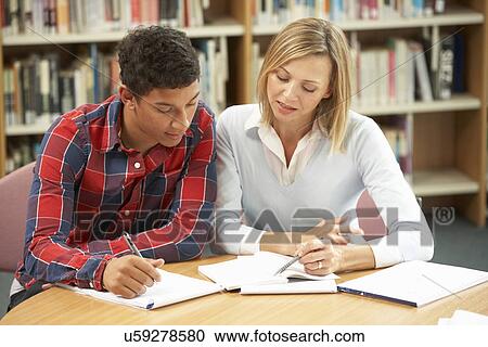 College tutor with student View Large Photo Image Stock Image - College tutor with student. Fotosearch