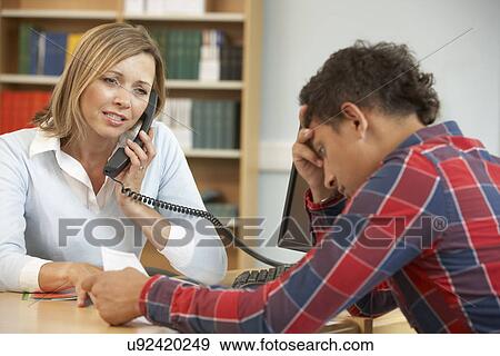 College tutor with student View Large Photo Image Stock Photo - College tutor with student. Fotosearch
