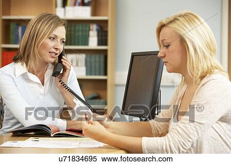 College tutor with student View Large Photo Image Stock Photography - College tutor with student. Fotosearch