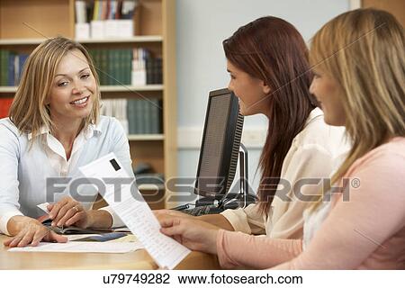College tutor with students View Large Photo Image Stock Image - College tutor with students. Fotosearch