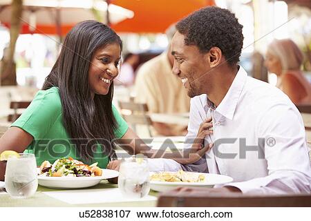 Couple Enjoying Lunch In Outdoor Restaurant View Large Photo Image Stock Photo - Couple Enjoying Lunch In Outdoor Restaurant. Fotosearch