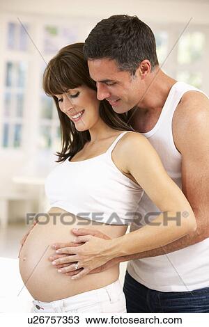 Couple expecting baby View Large Photo Image Stock Image - Couple expecting baby. Fotosearch