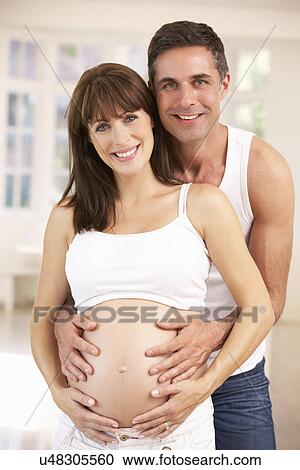Stock Image - Couple expecting baby. Fotosearch