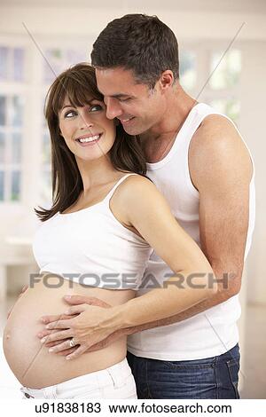 Stock Image - Couple expecting baby. Fotosearch