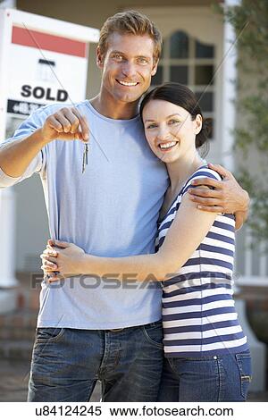 Couple moving house View Large Photo Image Stock Photography - Couple moving house. Fotosearch