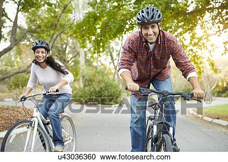 Couple On Cycle Ride In Countryside View Large Photo Image Stock Image - Couple On Cycle Ride In Countryside. Fotosearch