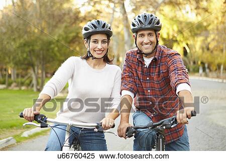 Couple On Cycle Ride In Countryside View Large Photo Image Stock Photography - Couple On Cycle Ride In Countryside. Fotosearch