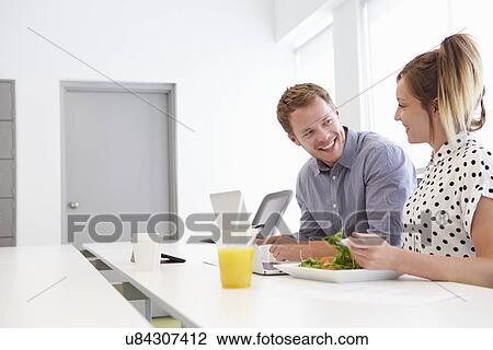 Creatives Having Working Lunch In Design Studio View Large Photo Image Stock Image - Creatives Having Working Lunch In Design Studio. Fotosearch