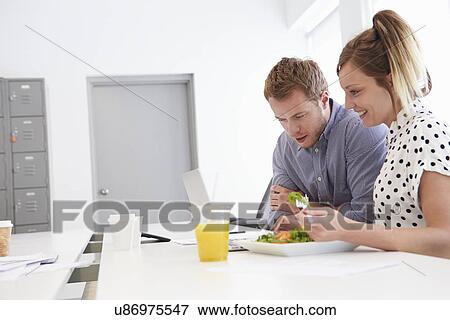 Creatives Having Working Lunch In Design Studio View Large Photo Image Stock Photo - Creatives Having Working Lunch In Design Studio. Fotosearch