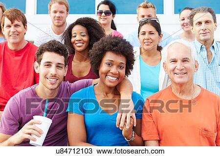 Crowd Of Spectators Watching Outdoor Sports Event View Large Photo Image Stock Image - Crowd Of Spectators Watching Outdoor Sports Event. Fotosearch