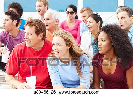 Crowd Of Spectators Watching Outdoor Sports Event View Large Photo Image Stock Photograph - Crowd Of Spectators Watching Outdoor Sports Event. Fotosearch