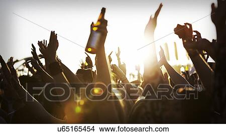 Picture - Crowds Enjoying Themselves At Outdoor Music Festival. Fotosearch