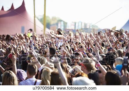 Picture - Crowds Enjoying Themselves At Outdoor Music Festival. Fotosearch