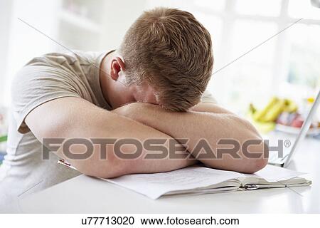 Depressed Boy Studying At Home View Large Photo Image Stock Image - Depressed Boy Studying At Home. Fotosearch