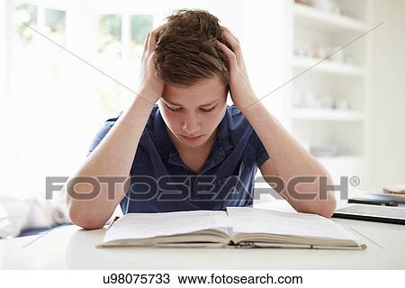 Depressed Boy Studying At Home View Large Photo Image Stock Image - Depressed Boy Studying At Home. Fotosearch