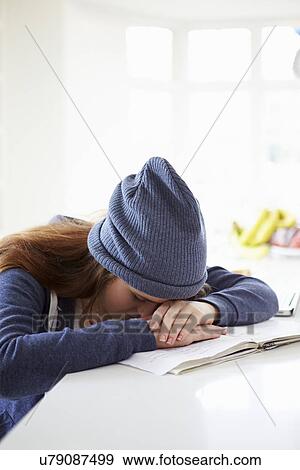 Depressed Girl Studying At Home View Large Photo Image Stock Photo - Depressed Girl Studying At Home. Fotosearch