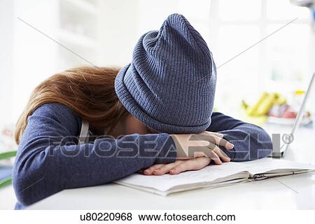 Depressed Girl Studying At Home View Large Photo Image Stock Photo - Depressed Girl Studying At Home. Fotosearch