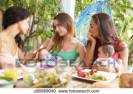 Depressed Mother With Baby Talking To Friends View Large Photo Image Stock Image - Depressed Mother With Baby Talking To Friends. Fotosearch