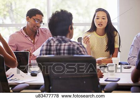 Designers Meeting To Discuss New Ideas View Large Photo Image Stock Photo - Designers Meeting To Discuss New Ideas. Fotosearch