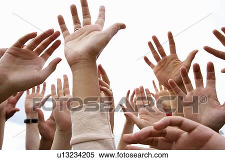 Detail young people's hands in air View Large Photo Image Stock Photography - Detail young people's hands in air. Fotosearch