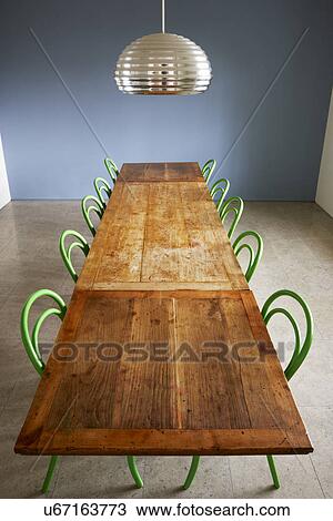 Stock Image - Dining Room In Modern House With Table And Chairs. Fotosearch
