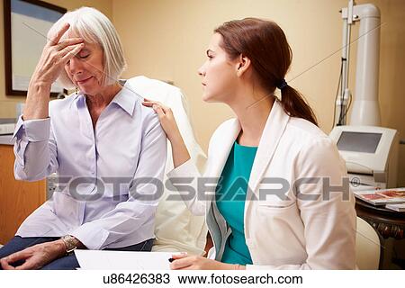 Doctor In Consultation With Senior Concerned Female Patient View Large Photo Image Stock Image - Doctor In Consultation With Senior Concerned Female Patient. Fotosearch