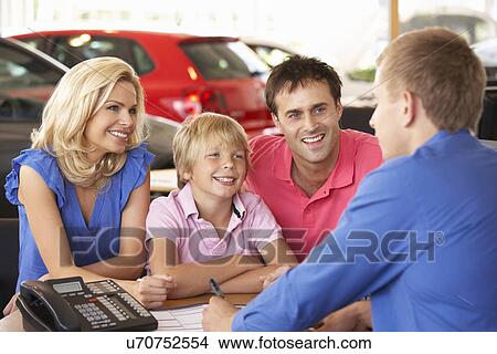 Family buying new car View Large Photo Image Picture - Family buying new car. Fotosearch