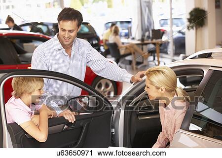 Family buying new car View Large Photo Image Stock Image - Family buying new car. Fotosearch