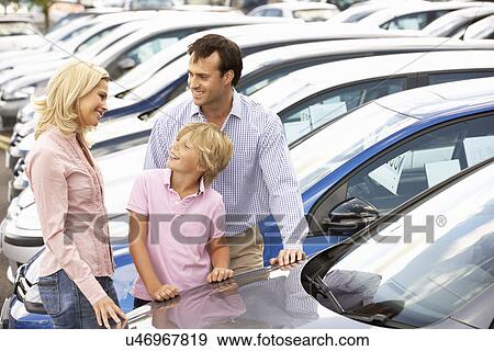 Family buying new car View Large Photo Image Stock Photo - Family buying new car. Fotosearch